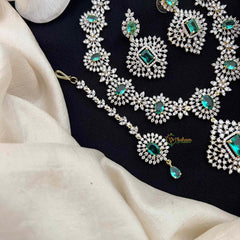 Vriksham Lavish Aqua Green Stone & American Diamond 3-Piece Set With Rectangular Statement Pendant Short Neckpiece-G21577