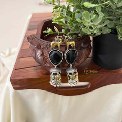 Vriksham Dual Tone Deer & Elephant Motif Jhumkas With Black Teardrop Stone Earrings-S1089